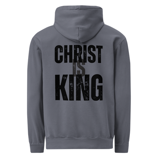Back view of the denim Christ Is King men’s hoodie featuring a large distressed black Christian graphic.