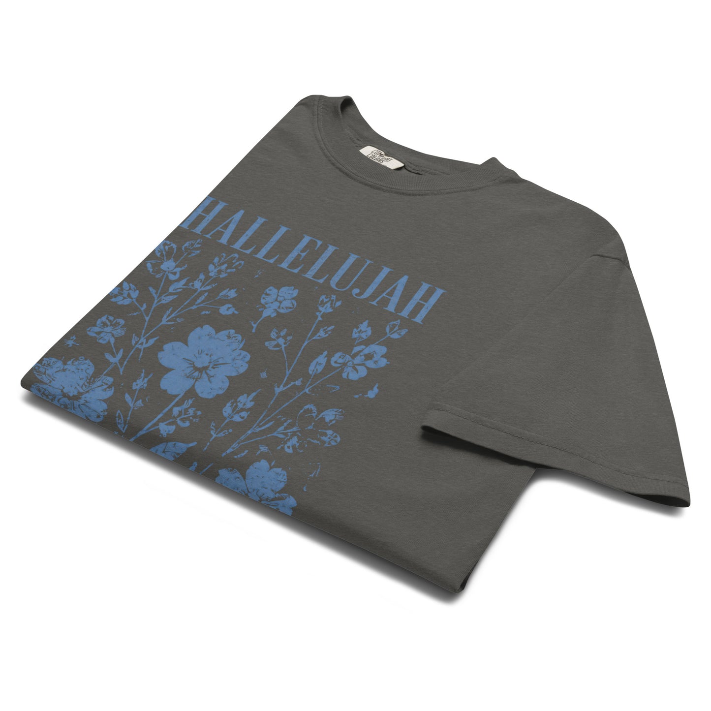 Angled close-up of the pepper Hallelujah T-shirt with blue floral Christian graphic