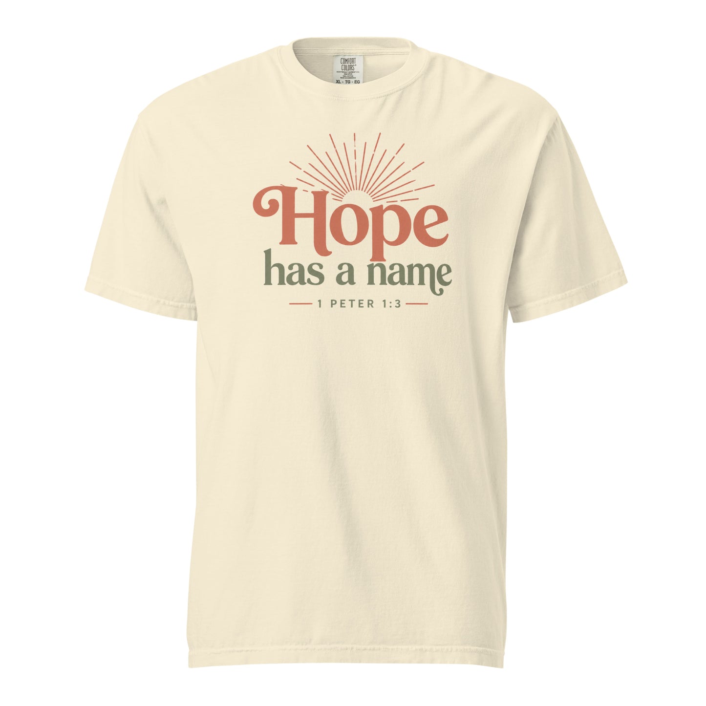 Ivory women’s Christian T-shirt with Hope Has a Name and 1 Peter 1:3 sunrise graphic, front view