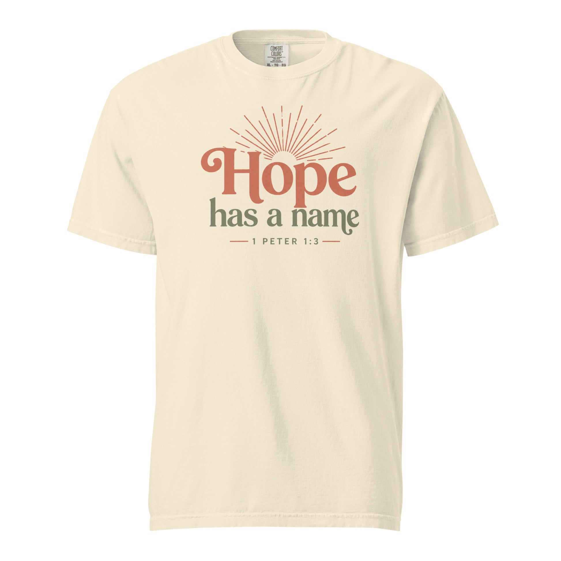 Ivory women’s Christian T-shirt with Hope Has a Name and 1 Peter 1:3 sunrise graphic, front view