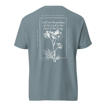 Back of the Ice Blue Psalm 27 scripture tee with floral artwork and “I will see the goodness of the Lord.”