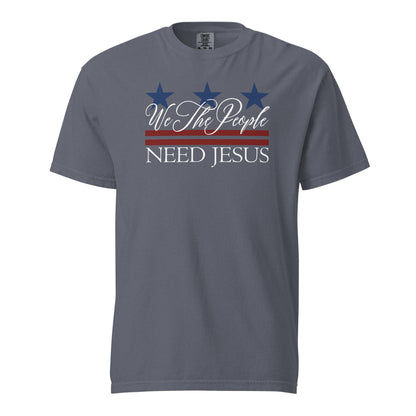 Denim blue men’s Christian T-shirt featuring a We the People Need Jesus patriotic design.